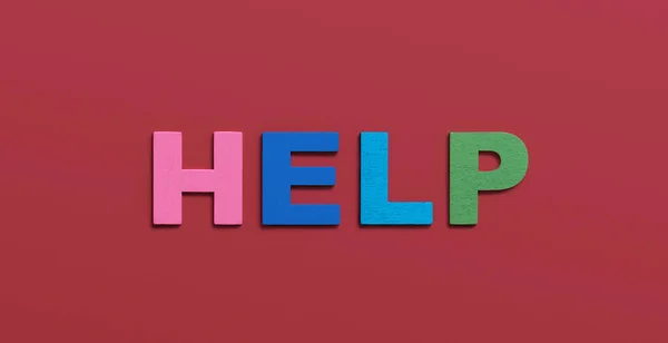Hilfe Wort Geschrieben Hölzernen Bunten Buchstaben Auf Rotem Hintergrund Konzept — Stockfoto