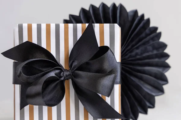 Gift Box Wrapped Striped Geometric Paper Black Ribbon Bow Close — 스톡 사진