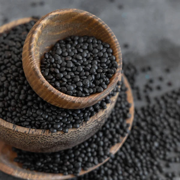 Wooden Bowls Black Beluga Lentils Beans Grey Table Close Healthy — Stock Photo, Image