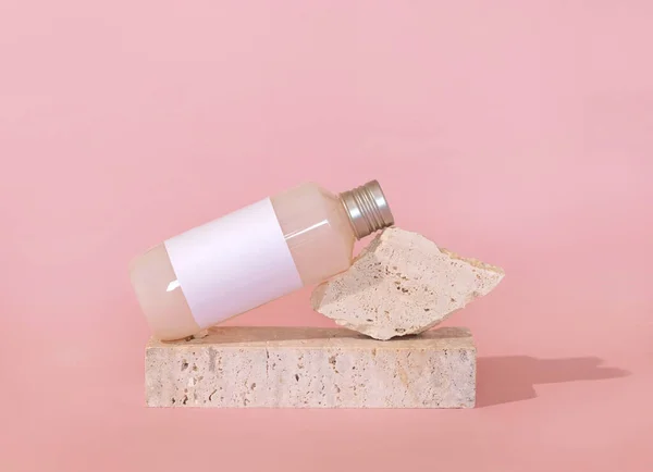 Bottle Blank Label Lies Lies Travertine Stone Light Pink Close — Φωτογραφία Αρχείου