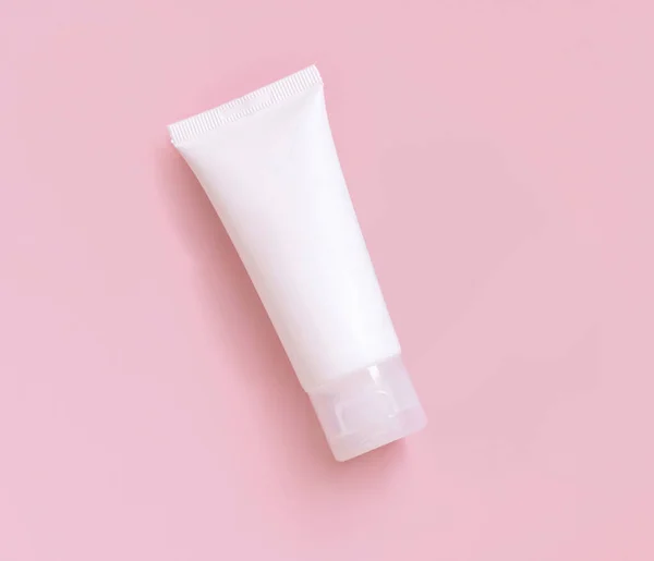 White Plastic Cream Tube Light Pink Top View Cosmetic Mockup — Fotografia de Stock