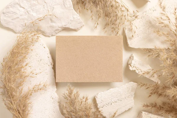 Blank Kraft Paper Card Beige Travertine Stones Dried Pampas Grass — Stock Photo, Image