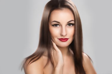 Beautiful woman with long straight brown hair