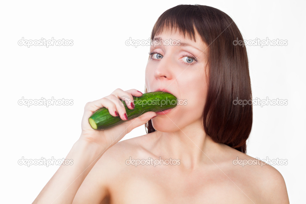 Girl with cucumber