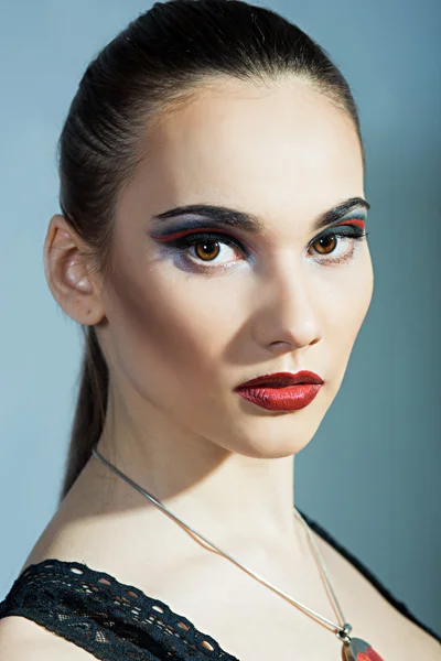 Thin brunette with bright red lips — Stock Photo, Image