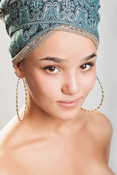 Beautiful woman in a turban — Stock Photo, Image