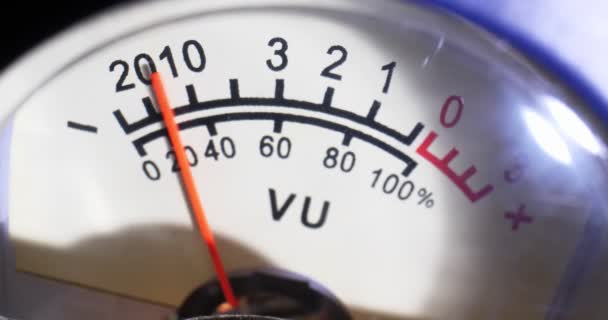 Detailed extreme close-up, moving arrow of analog VU meter scale — Stock Video