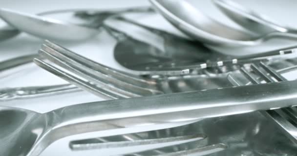 Extreme close-up, detailed. stainless steel spoons and forks — Videoclip de stoc