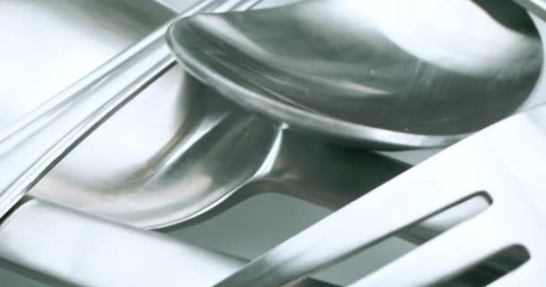 Extreme close-up, detailed. stainless steel spoons and forks — Vídeos de Stock