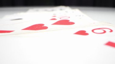 extremely close-up detailed, randomly lying playing cards