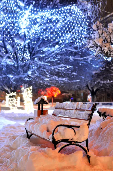 Bench covered in snow — Stock Photo, Image