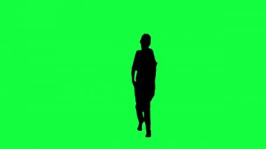 yeşil bir arka plan bir dans eden kadın silüeti