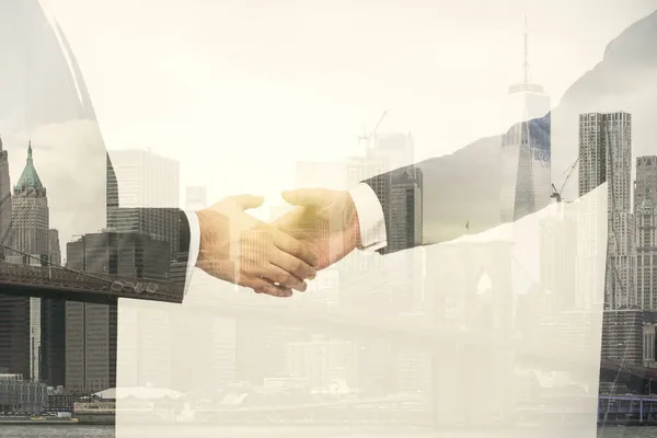 Multi exposure of handshake two businessmen on office buildings background, collaboration and teamwork concept — Stock Photo, Image
