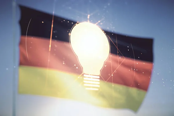 Abstract virtuele gloeilamp illustratie op Duitse vlag en zonsondergang hemel achtergrond, toekomstige technologie concept. Meervoudige blootstelling — Stockfoto