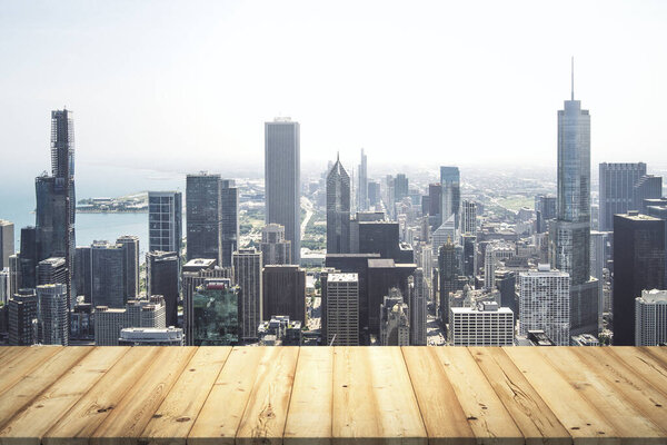 Wooden tabletop with beautiful Chicago buildings on background, mock up