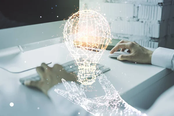 Creative idea concept with light bulb illustration and hands typing on laptop on background. Multiexposure — Stock Photo, Image