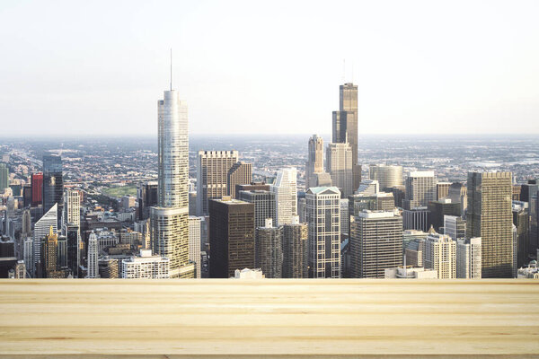 Blank table top made of wooden planks with beautiful Chicago cityscape at daytime on background, mockup