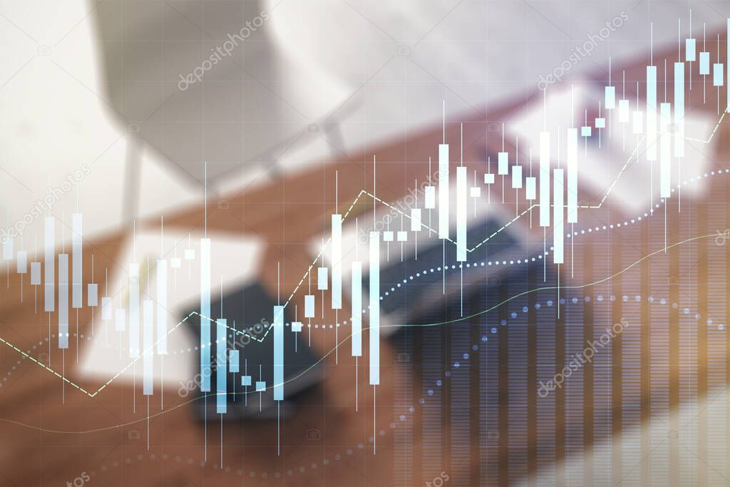 Double exposure of abstract creative financial diagram and modern desk with computer on background, banking and accounting concept