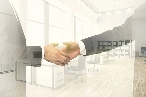 Double exposure handshake of two businessmen on modern furnished office interior background, collaboration and coworking concept — Stock Photo, Image