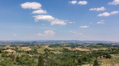 Landscape scenery of the beautiful hills, trees and fields of Tuscany, Italy