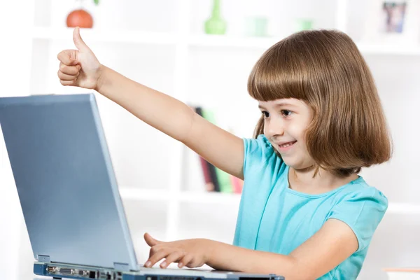 Little girl with laptop — Stock Photo, Image