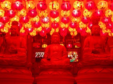 chinese temple with three buddhas. paper lanterns are coloring e clipart