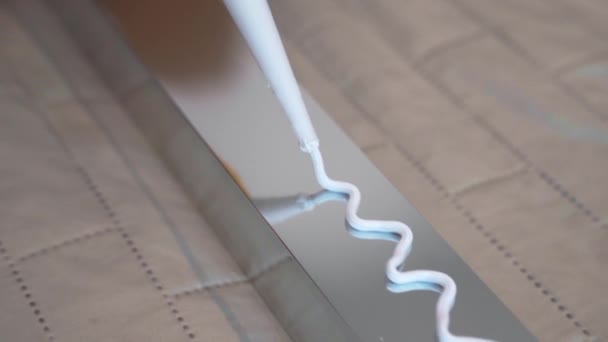 Top View Shot White Glue Applying Metal Profile Surface Workman — Stock Video