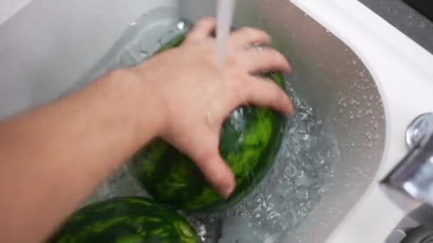 Ripe Watermelons Kitchen Sink Person Hands Washing Watermelons Flow Water — Stockvideo