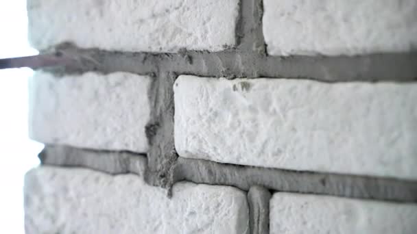 Close Shot Renovates Wall Decorative Stones Workman Grouting Joints Special — Video Stock