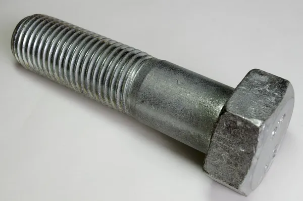 A bolt on the tablel — Stock Photo, Image