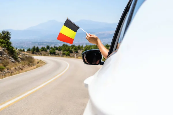 Woman Holding Belgium Flag Open Car Window Driving Serpentine Road — Stock Photo, Image
