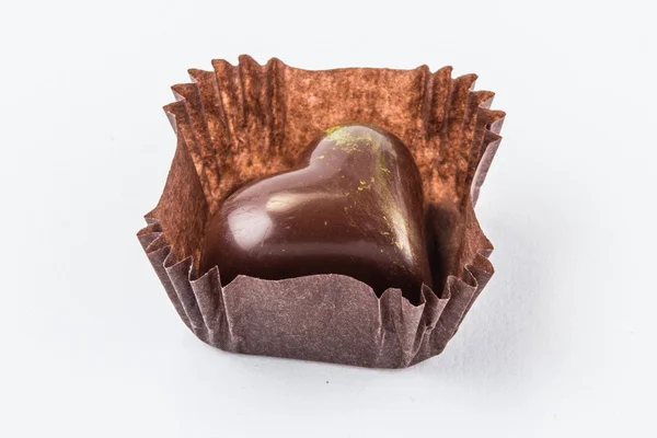 Bonbons au chocolat isolés sur fond blanc — Photo