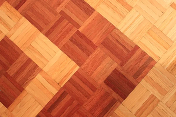 Teak floor of quadratic sticks forming an arrow — Stock Photo, Image