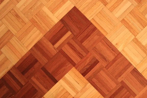 Teakwood gulv af kvadratiske pinde danner en pyramide - Stock-foto
