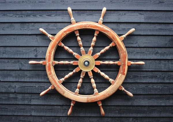 Old trawler steering wheel made of hardwood — Stock Photo, Image