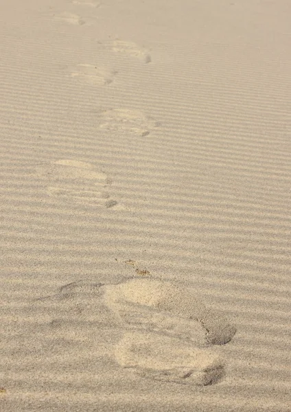 Isolated horizontal sandy wave texture with footprint — Stock Photo, Image