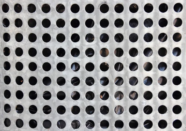 Closeup on steel barrel with black plastic inside — Stock Photo, Image