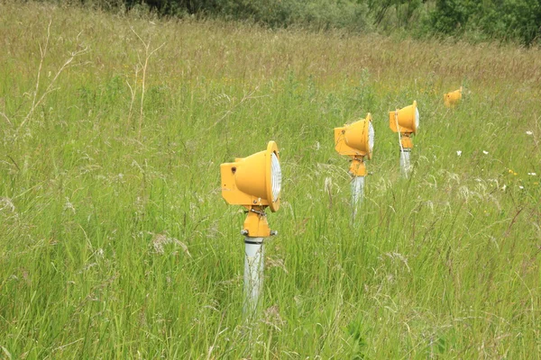 Horizontal line of runway landing lights — Stock Photo, Image