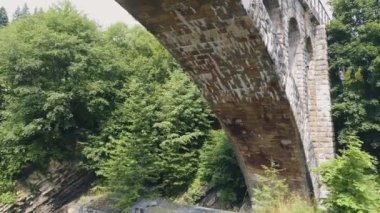 Vorokhta, Ukraine Old railway bridge, old viaduct Vorohta, Ukraine. The Carpathian Mountains, wild mountain landscape. High quality FullHD footage