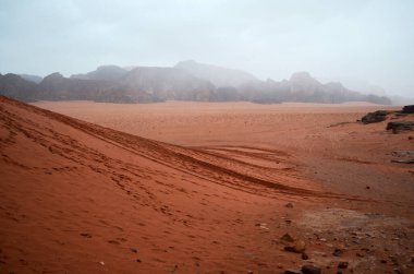 Rain in the red desert Wadi Musa in Jordan