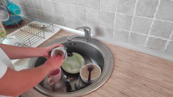 Young Woman Washing Dishes Kitchen Sink — Stock Video