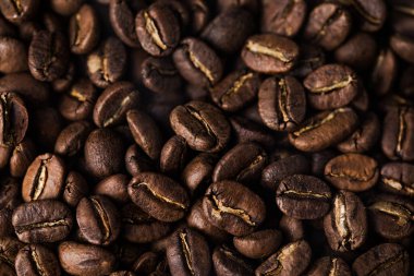 Kahve çekirdeği dokusu ya da kahve arkaplanı. Kokulu fasulye dumanı..