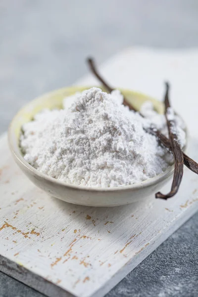 sugar powder with ground natural vanilla