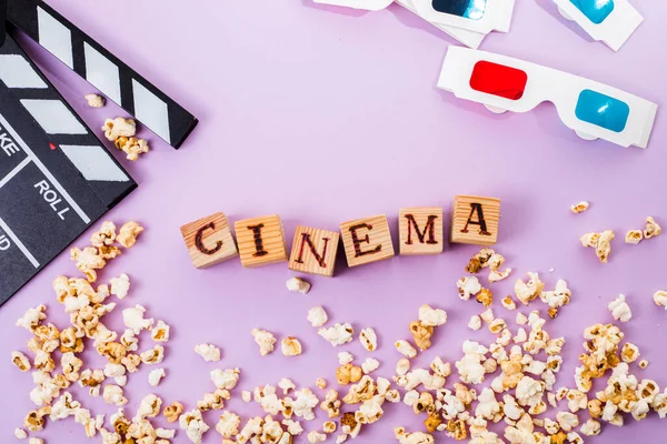 Word Cinema Popcorn Clapperboard Glasses Tickets Top View Flat Lay — Stock Photo, Image