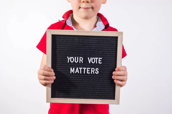 Kid Boy Holding Letter Board Text Your Vote Matters White — Stockfoto