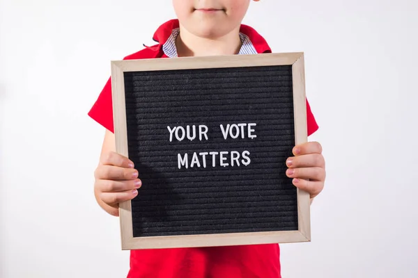 Kid Boy Holding Letter Board Text Your Vote Matters White — Stockfoto