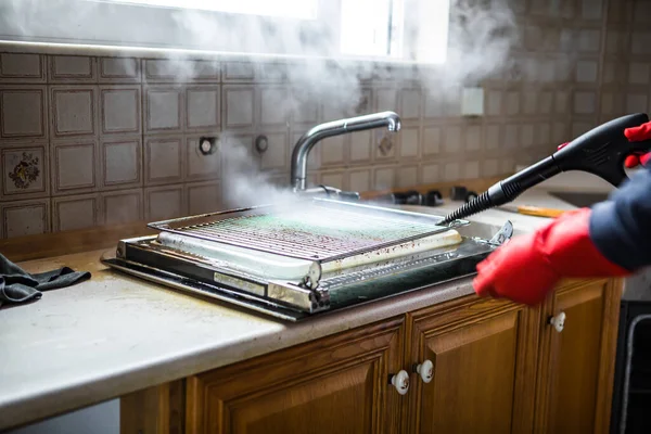 Gloved Cleaner Washing Oven Steamer Home Closeup — Stockfoto