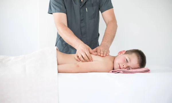 Boy Toddler Relaxes Therapeutic Massage Physiotherapist Working Patient Clinic Treat — Stock Photo, Image