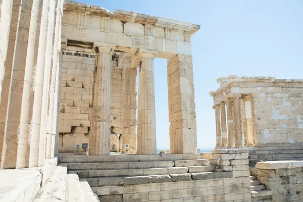 Parthenon temple, old Greek ruins at sunny day in Acropolis of Athens, Greece. Acropolis of Athens on hill with amazing and beautiful ruins Parthenon