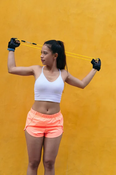 Young Young Girl Trains Resistance Bands Open Air — Stock fotografie